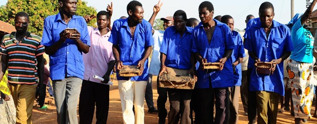 Men play "Akongo", a traditional music instrument for the Teso people in Serere